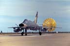 Picture of an F-100D landing, drag chute out.Click on this picture to
start the video.