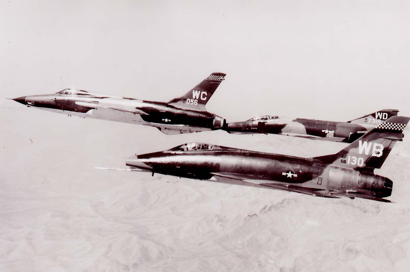 F-100D #56-3130, F-100D in formation with F-105 and
 F-4E