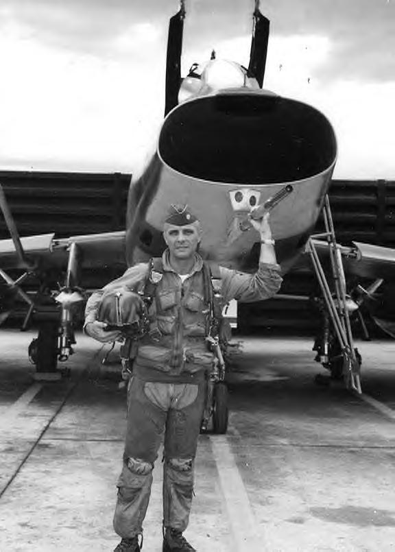 F-100D, Maj. Dick Roussell in front of 
 an F-100D, Phan Rang, South Vietnam, 1970
