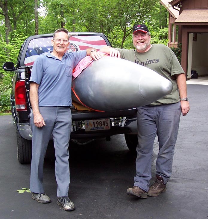 Photo of Charles Dawson in front of his pickup truck. Click on the picture to enlarge it.