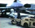 Picture of a Rick Norris bomb loading frame. Click on this 
          picture to start the video.