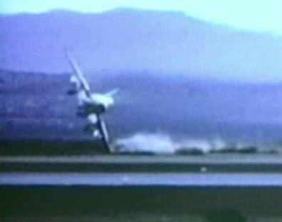 View of a well-documented F-100 crash. Click on this 
          picture to start the video.