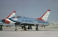 Picture of an F-100D in Thunderbird colors. Click on this 
          picture to start the video.