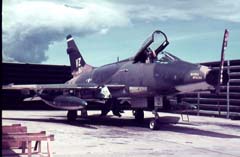 Picture of an F-100D in a revetment, Vietnam. 
               Click on this picture to start the video.